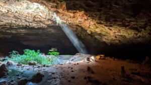 A shaft of sunlight penetrates the cave © Steve Milner