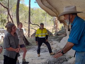 Traditional Custodian Hilton (JR) Richards (far right) sharing his knowledge with the team (Rungulla National Park 2022) (image: Tim Holloway)